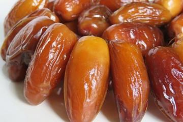 Sweet dried date fruit on white background, closeup