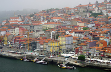 Fototapeta na wymiar Embankment Douro in Porto, view of the old part of the city. Portugal