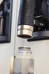 Damaged gun tanker hose. shallow depth of field. have toning