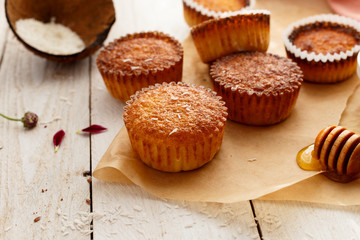 Obraz na płótnie Canvas Cupcakes with honey. Homemade. Bakery. Coconut.