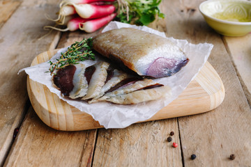 Raw fish fillet. On the kitchen. Wooden. Cuisine. Homemade. Healthy food.