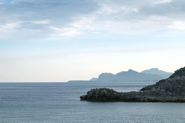 Fototapeta na wymiar Silhouettes of Islands in the Mediterranean sea, Greece.