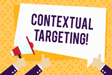 Writing note showing Contextual Targeting. Business concept for targeted advertising for ads appearing on websites Hand Holding Megaphone and Gesturing Thumbs Up Text Balloon