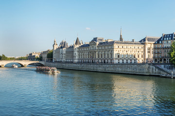 Fototapeta na wymiar Pleasure boat with people sailing on the river Seine. Paris. France. 
