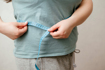 fat girl on diet, Overweight fat woman with a little portion of food trying to lose weight. Extreme...