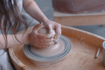 Close up of hands doing the pottery, Selective focus at pottery.