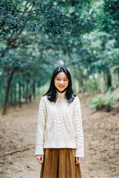 Portrait of a Asian young woman in the forest