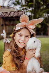 little girl with bunny ears easter