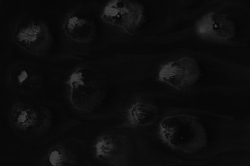 Naklejka premium Black alcohol ink texture with abstract washes and paint stains on the white paper background. 