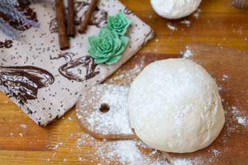 yeast dough for baking sprinkled with flour