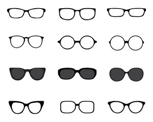 Black silhouettes of different eyeglasses on a white background