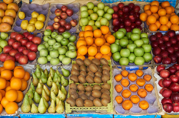 Fruit market with various colorful fresh fruits and vegetables