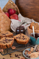 Cake with cocoa and chocolate on a wooden table. Sweet homemade pastries for breakfast. Rustic style photo.