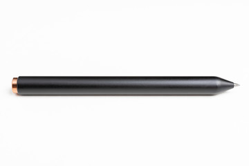 A close-up studio product shot of a modern matte finish black barrel clicker ballpoint pen set on a plain white background.