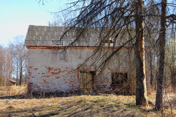 Abandoned brick barn, derelict village, devastation building