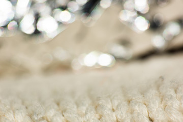 Soft knitted fabric background with bokeh