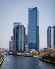 Fototapeta na wymiar Buildings and a river in Osaka, Japan