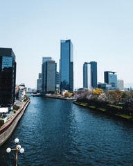 Buildings and a river in Osaka, Japan close to the castle