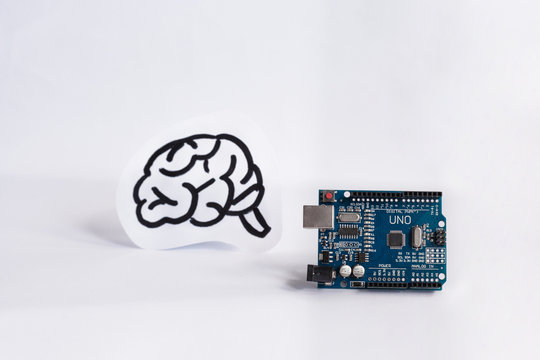 Arduino Uno. Micro controller. Technology. Electronic computing machine. Concept. High intelligence. Brain. The science. White background.