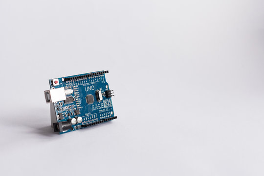  Arduino Uno. Micro controller. Technology. Electronic computing machine. Concept. High intelligence. Free space for text. STEM education.