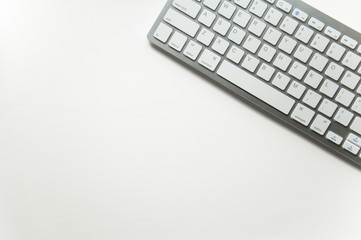 Keyboard on a white background. Typing office work. School and learning background for site.