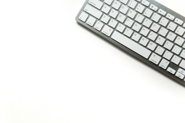 Keyboard on a white background. Typing office work. School and learning background for site.