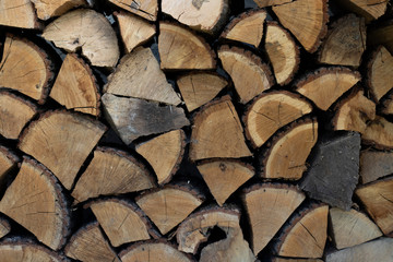 Wall firewood, Background of dry chopped firewood logs