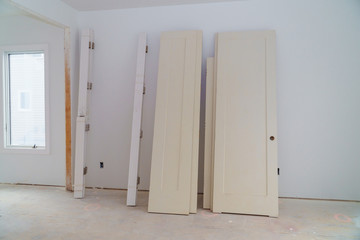 Interior construction of housing project with drywall installed door for a new home before installing