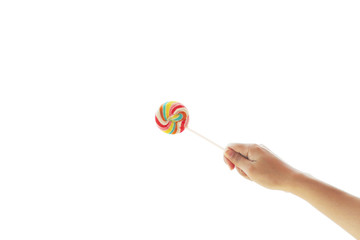 woman hand with colorful lollipop isolated on white background