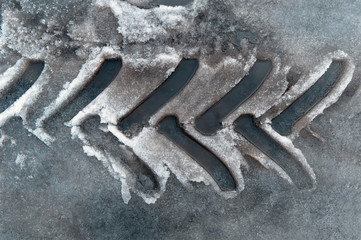Imprint tractor tires on the snow.View from above.