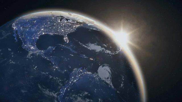 Impressive sunrise over the Western Hemisphere, planet Earth with rising sun in space. Some elements of this footage furnished by NASA images
