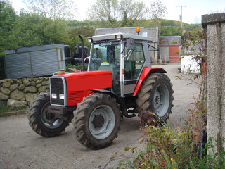Red Tractor on Farmyard