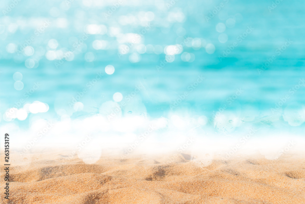 Wall mural tropical nature clean beach and white sand in summer with sun light blue sky and bokeh background.