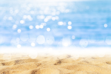 Plakat Tropical nature clean beach and white sand in summer with sun light blue sky and bokeh background.