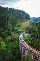 Train on the Nine Arch Bridge in Sri Lanka. Travel to Ceylon island, popular travel  destination in...