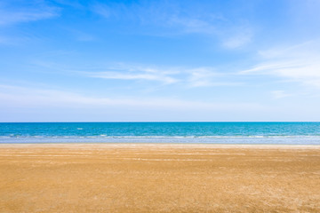 Fototapeta na wymiar Abstract beach background. Yellow sand, blue sky