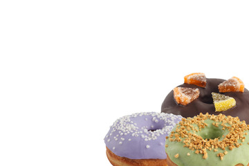 Different bright tasty donuts on a white background. Place under the text. Diversity.