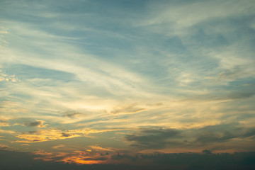 sunlight through cloud on dramatic sunset sky
