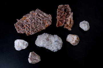 Set of stones minerals calcium and gypsum on black background