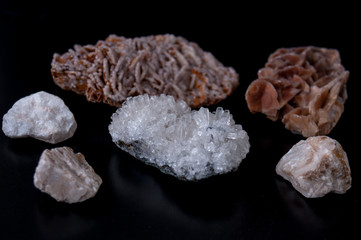 Set of stones minerals calcium and gypsum on black background