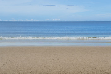 Sea view from tropical beach with sunny sky at daytime.