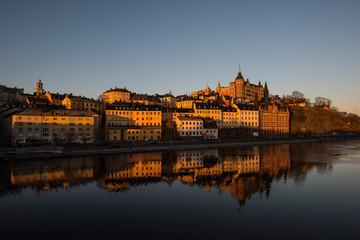 View over old houses in the Södermalm district a spring day at sunrise in Stockholm from the...