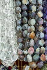 Background from beads. beads market necklaces. vertical photo