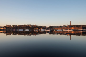 View over old houses in the Södermalm district a spring day at sunrise in Stockholm from the Norrmälarstrand pier