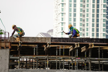 Fototapeta premium Construction worker with safety attire 