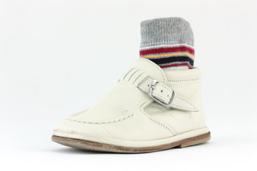 pair of baby shoes isolated on white background