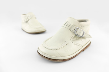 Fototapeta na wymiar pair of baby shoes isolated on white background
