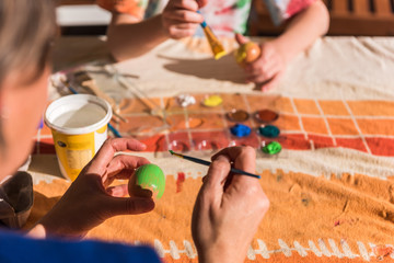 Easter Family Painting Eggs