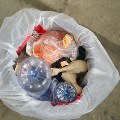 rubbish bin with rubbish,