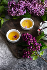 Obraz na płótnie Canvas Tea concept with lilac